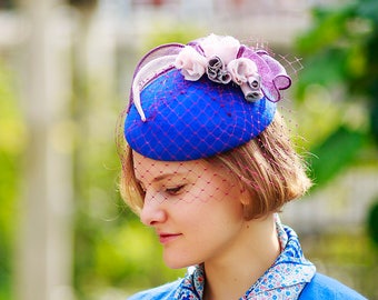 Hand made navy wool felt fascinator decorated with flowers, vintage style veil and sinamay handcrafted leaves