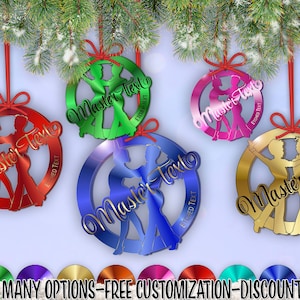 May include: Four round, colorful, personalized ornaments featuring a dancing couple silhouette. Each ornament has the text "Master Text" etched on it. The ornaments are hanging from a Christmas tree.
