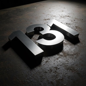 Laser Cut Stainless Steel House Numbers - 8 Inch Custom Font shown in an AI-generated listing photo