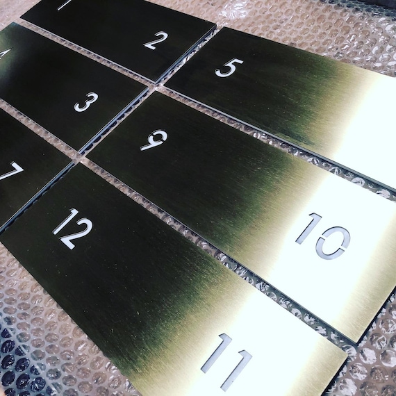 Laser Cut Brass house and business plaques - custom made in any size