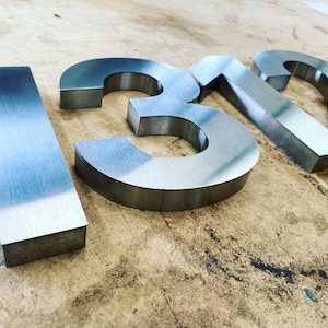 Números de casa feitos sob medida de aço inoxidável cortados a laser 3D