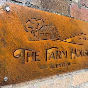 May include: A rusty metal sign featuring a farmhouse silhouette and the text "THE FARM HOUSE GLENVIEW" in a rustic font.