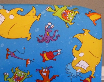 Crib Sheet or fitted toddler sheet in prankster and fun boogie monsters, Blue or green table top changing pad cover