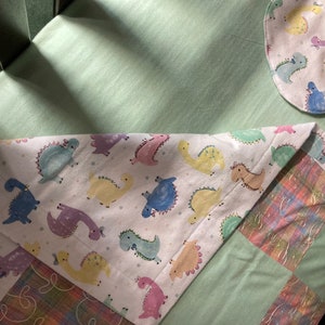 6 piece baby bundle, crib sheet, blanket, changer cover, painting, burp cloth, and bib in muted tones of green/dinosaurs, ships in 24 hrs