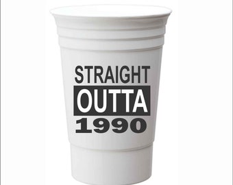 May include: White plastic cup with black text that reads "STRAIGHT OUTTA 1990".