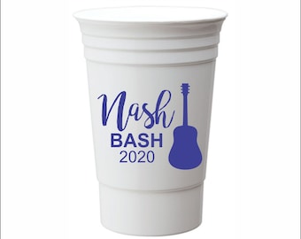 May include: White plastic cup with a blue silhouette of a guitar and the text "Nash Bash 2020" printed on the side.