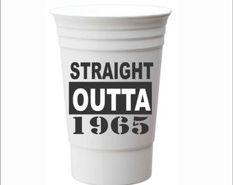 May include: White plastic cup with the text "STRAIGHT OUTTA 1965" printed in black.