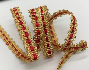 May include: Red and gold trim with a decorative scalloped edge.