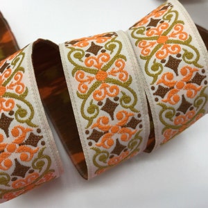 Jacquard  Ribbon Trim X scroll pattern~Orange~brown~mustard on cream~1"