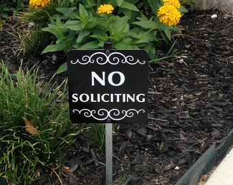No Soliciting Sign Attached to a Sturdy Aluminum Stake. Perfect sign for flower pots, planter boxes or flower beds. FREE SHIPPING