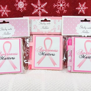 porte-notes autocollants pour la sensibilisation au cancer du sein.  Post-it et stylo inclus