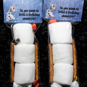 Snowman from frozen party favor Marshmallows pretzels chocolate chips. image 1