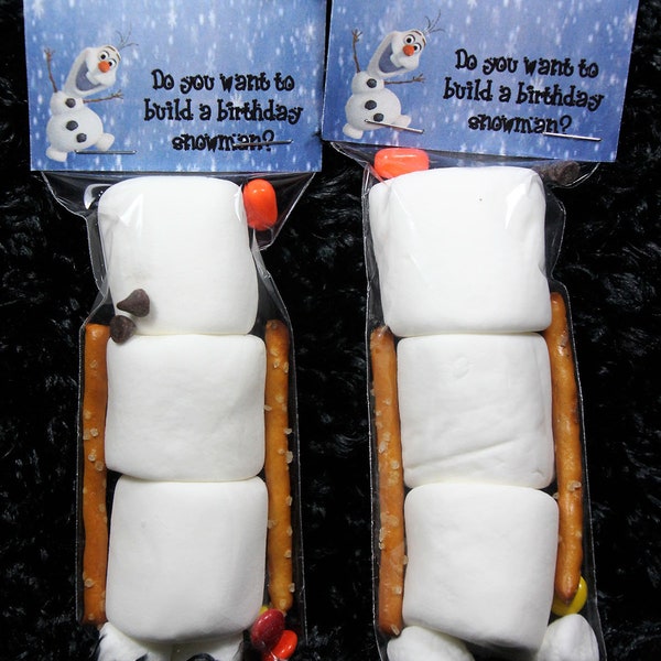 Snowman from frozen party favor ~ Marshmallows ~ pretzels ~ chocolate chips.