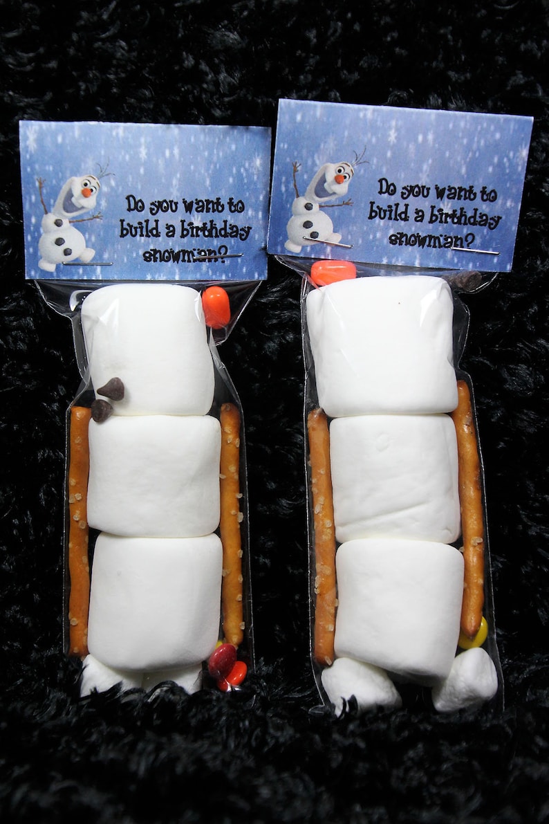 Snowman from frozen party favor Marshmallows pretzels chocolate chips. image 1