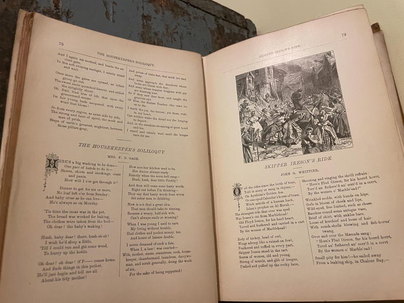 May include: An open book with two pages of text. The left page features a poem titled "The Housekeeper's Soliloquy" by M. E. Owen. The right page features a poem titled "Skipper Ireson's Ride" by John G. Whittier.