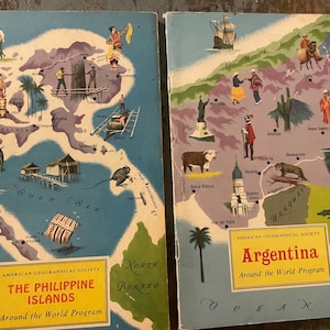 May include: Two vintage educational maps from the American Geographical Society's Around the World Program. The left map shows the Philippine Islands with a blue ocean background and green islands. The right map shows Argentina with a brown and green landmass and a blue ocean background. Both maps have the title of the country and the program name.