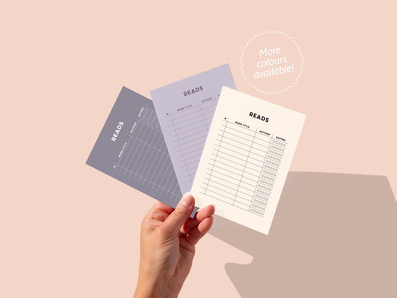May include: Three printable reading log sheets with the word "READS" at the top. The sheets are in different colors: purple, light purple, and white. The sheets have columns for book title, author, and rating.