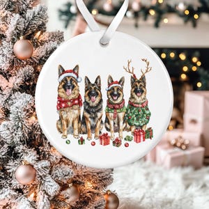 May include: Four German Shepherd dogs wearing Christmas hats and sweaters, with one dog wearing reindeer antlers, are standing in a row in front of presents. The dogs are all smiling and looking at the camera. The background is white.