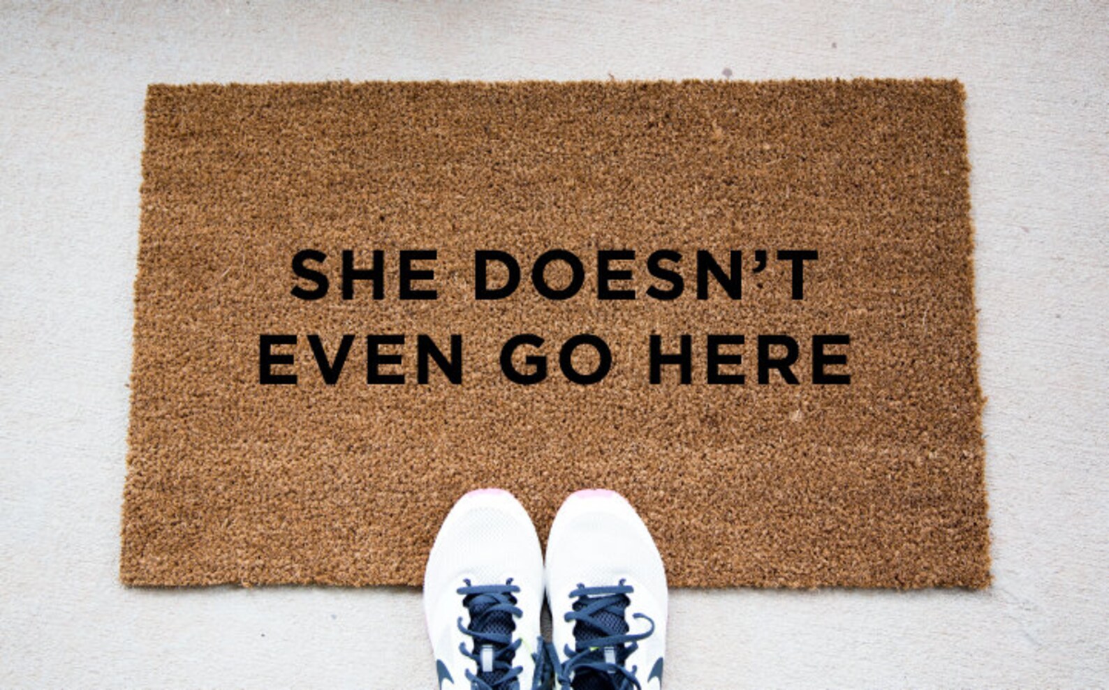 She doesn't even go here. She doesn't even go here. Even go. Go there. Коврик для двери юмор.