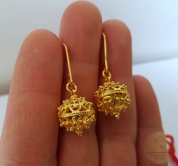 Suresh 1 gram gold earrings german silver earrings and studs bali round  pendant and locket top