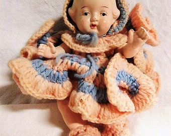 1940s Marked Occupied Japan Bisque Hand Painted Doll With Hand-Crocheted Pink and Blue Outfit