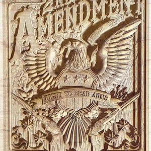 May include: A wooden sign with a carved eagle and the text "2nd Amendment Right to Bear Arms".