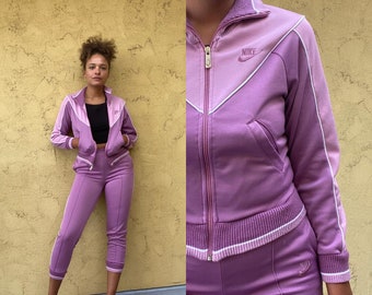 purple nike jogging suit