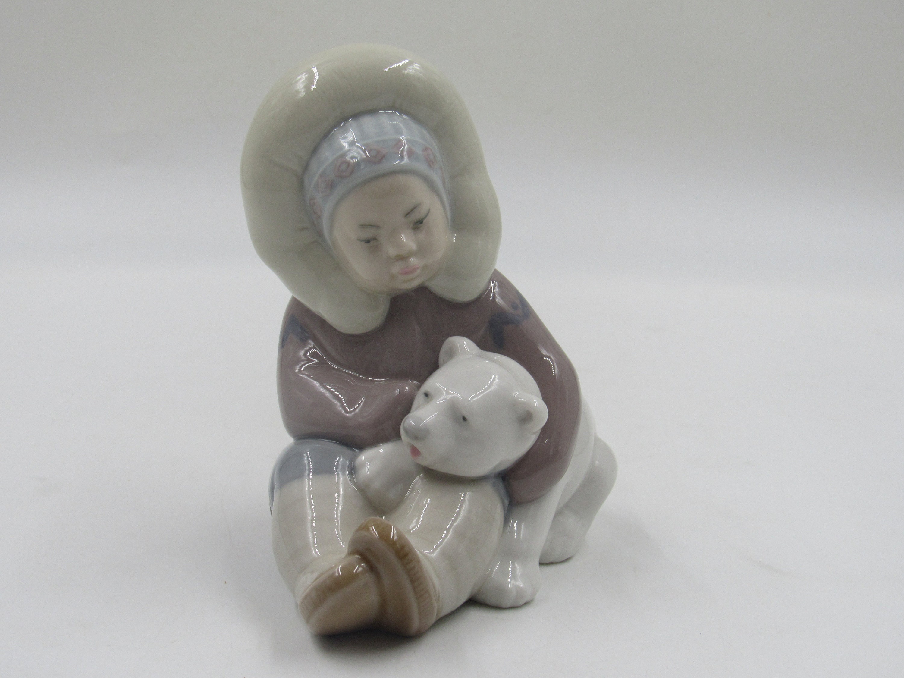 Pensive Eskimo Boy Pottery Figurine by Francisco Catalá for Lladró - Jeroen  Markies Art Deco