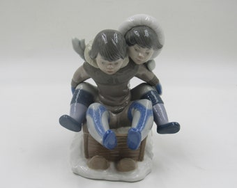 Lladro 5665 "Hang On!" Eskimo Children Sleigh Riding Porcelain Figurine