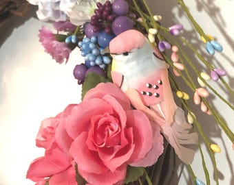 Spring Floral Wreath with pretty pastel bird, and purple butterfly.