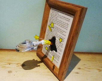 The magic of books, Starship flying out of a bookpage, Science Fiction decoration, recycled book!