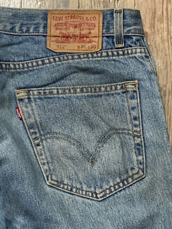 Distressed Levi’s 512  red tab