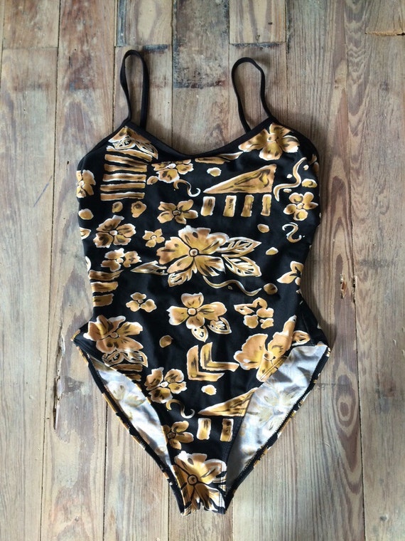 White and top gold swimsuit