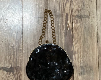 Bolso de muñeca con lentejuelas de los años 80