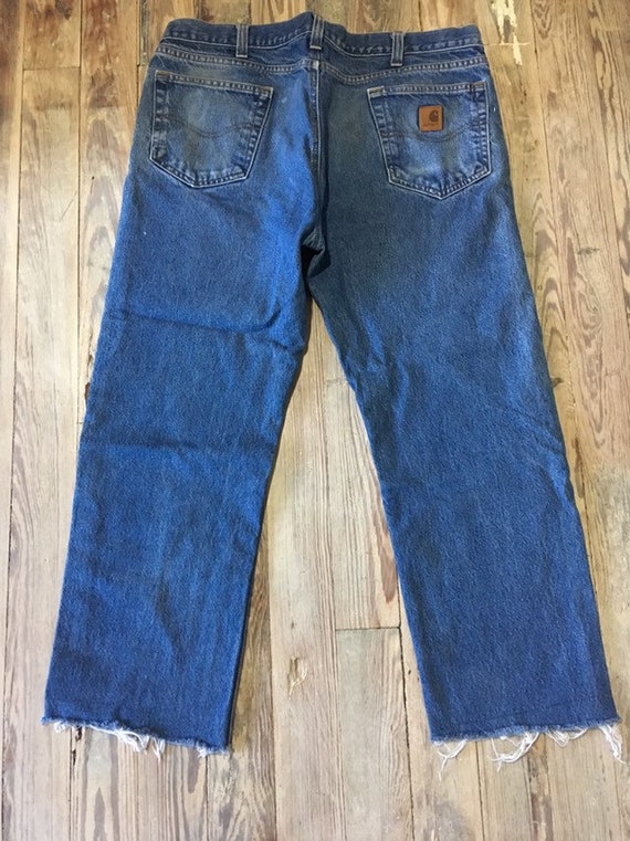 Artist/carpenter worn carhartt jeans raw hem - image 6