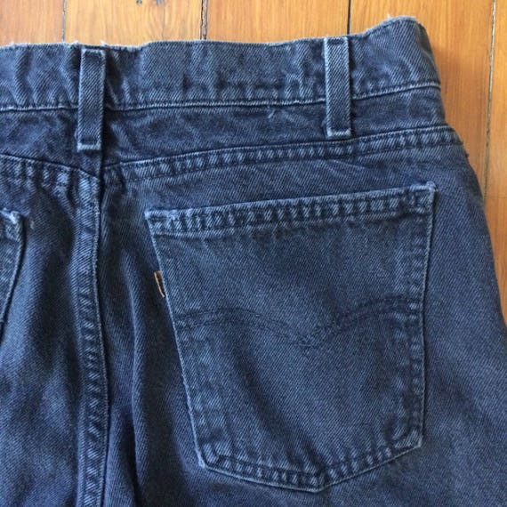 Black Levis Orange tabs
