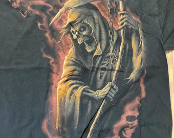 May include: Black t-shirt with a graphic print of the Grim Reaper holding a scythe. The Reaper is depicted in a hooded robe with a skull face and is surrounded by smoke.