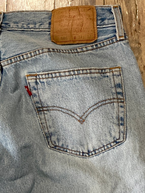 Levi’s 501 distressed denim