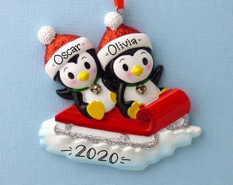 Baby Penguins on a Sled Personalized Ornament - Red Twin Outfit - Toddlers - Baby's First Christmas - Hand Personalized Christmas Ornament