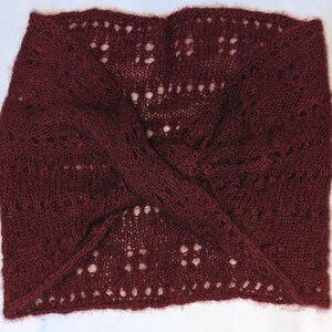 Hand Knitted Mobius Hand Dyed Cranberry Made in Alaska A circular Scarf worn around the neck
