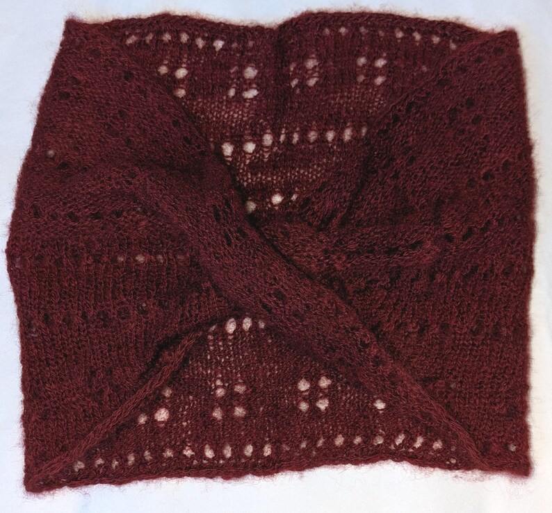 Hand Knitted Mobius Hand Dyed Cranberry Made in Alaska A circular Scarf worn around the neck