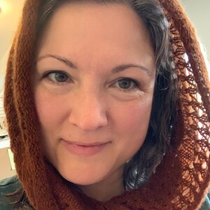 100% qiviut hand knit mobius each one is unique in that the pattern is free form meaning no two are alike Hand Knitted Mobius Hand Dyed Willow Made in Alaska A circular Scarf worn around the neck