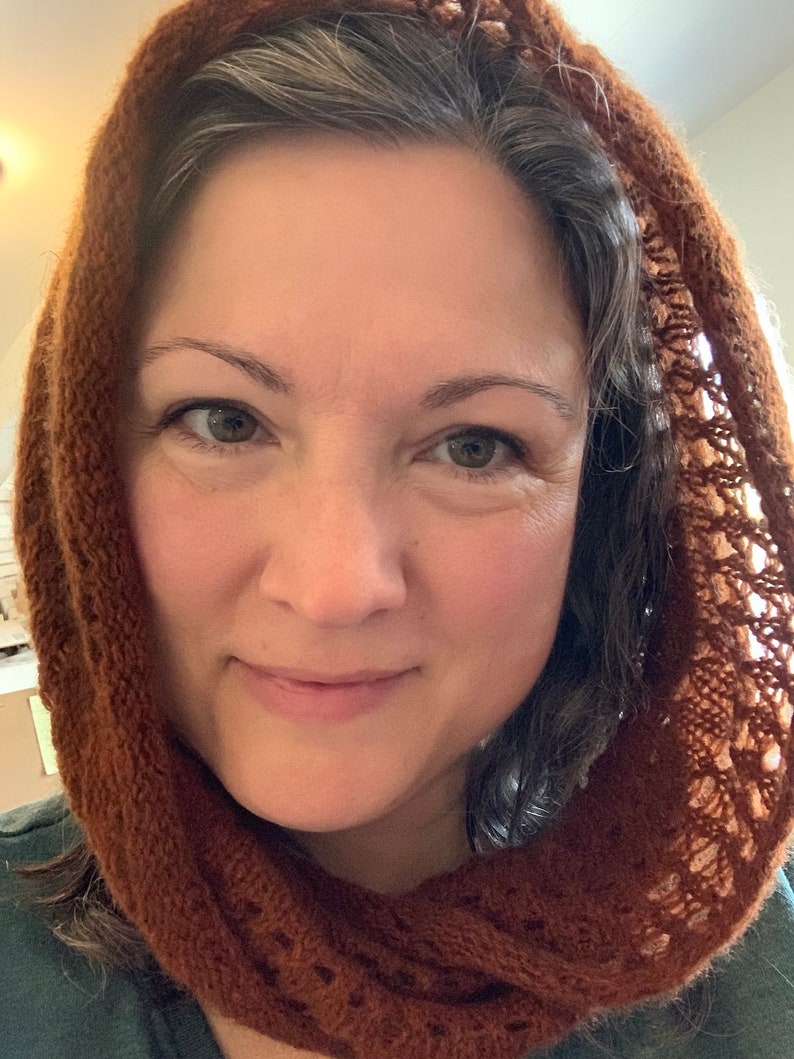 100% qiviut hand knit mobius each one is unique in that the pattern is free form meaning no two are alike Hand Knitted Mobius Hand Dyed Willow Made in Alaska A circular Scarf worn around the neck