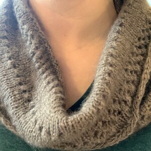 100% qiviut hand knit mobius each one is unique in that the pattern is free form meaning no two are alike Hand Knitted Mobius Natural Color Made in Alaska A circular Scarf worn around the neck