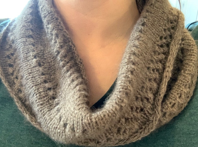 100% qiviut hand knit mobius each one is unique in that the pattern is free form meaning no two are alike Hand Knitted Mobius Natural Color Made in Alaska A circular Scarf worn around the neck