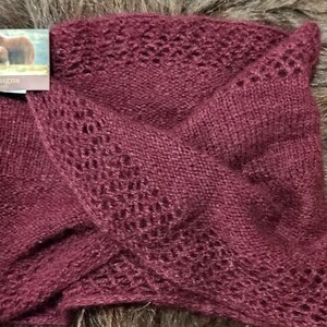 100% qiviut hand knit mobius each one is unique in that the pattern is free form meaning no two are alike Hand Knitted Mobius Hand Dyed Raspberry Made in Alaska A circular Scarf worn around the neck