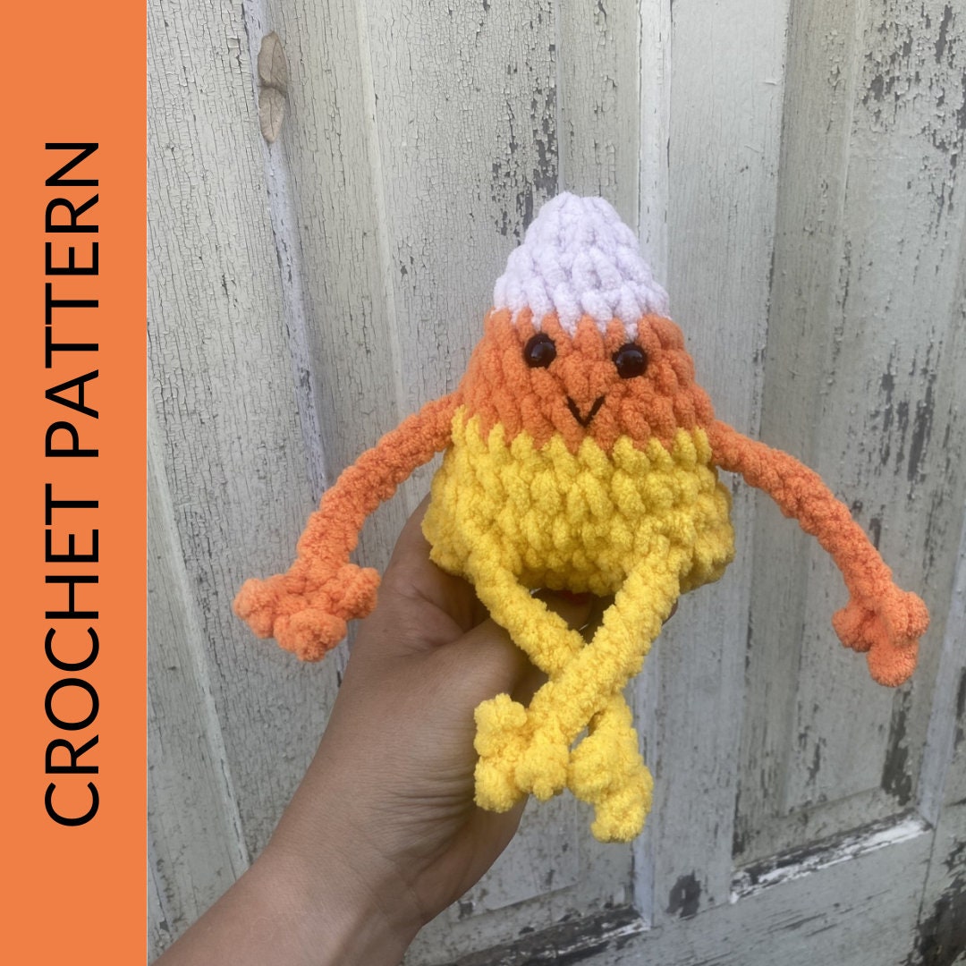30 Candy Corn Crochet Patterns to Sweeten Your Autumn Decor 22 Leggy Candy Corn No-Sew Pattern