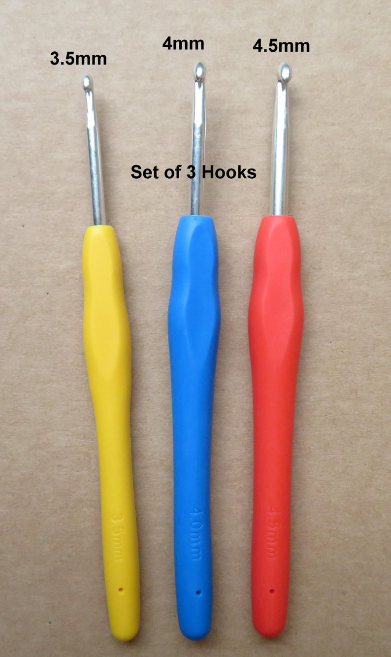 May include: Set of 3 crochet hooks with colorful handles. The hooks are 3.5mm, 4mm, and 4.5mm. The handles are yellow, blue, and red. The text "Set of 3 Hooks" is visible.