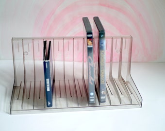 Transparent CD rack, plastic wall rack for CD's / DVD’s