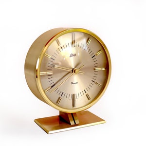 50er Jahre Mid Century Messing Schreibtisch-UHR, Electra Schatz, Atomic Kaminuhr Germany